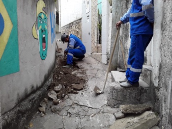 Reparo de piso de beco em Itararé